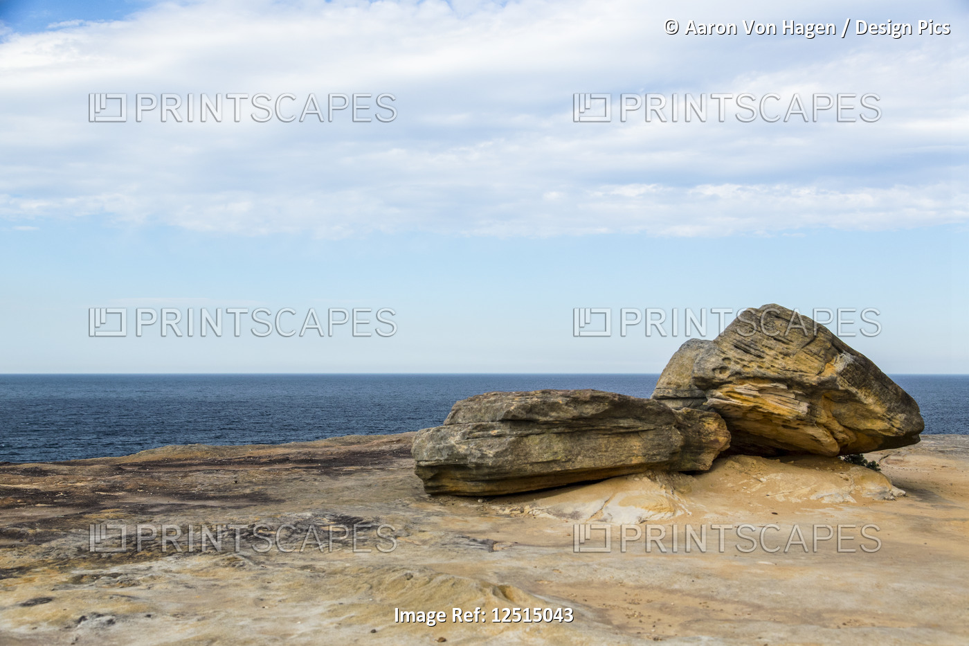 Rocks on the shore of Bondi Beach and the blue Tasman Sea in the South Pacific; ...