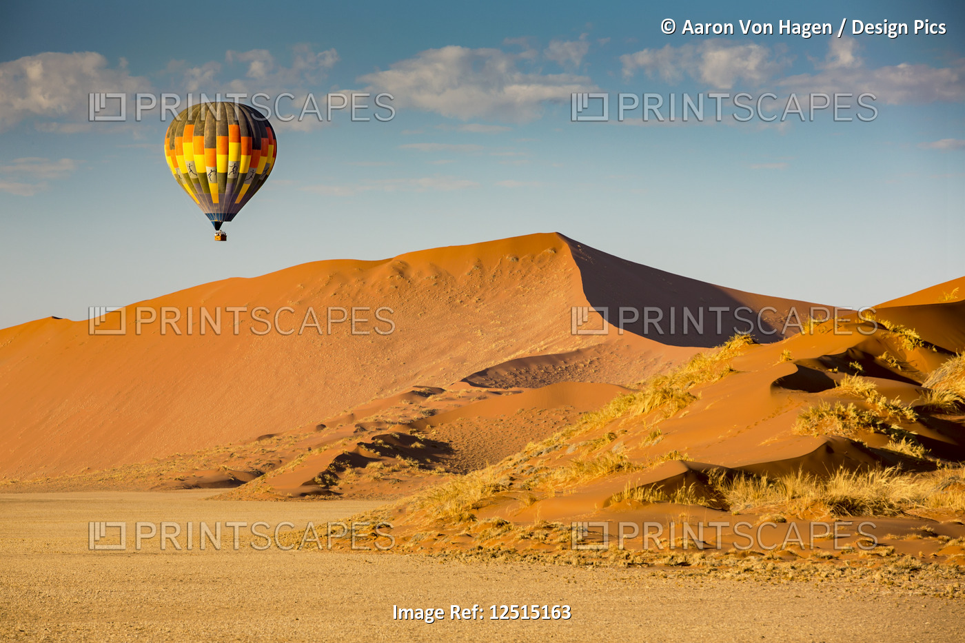 Hot air balloon ride over the red sand dunes of Sossusvlei in Namibia; ...